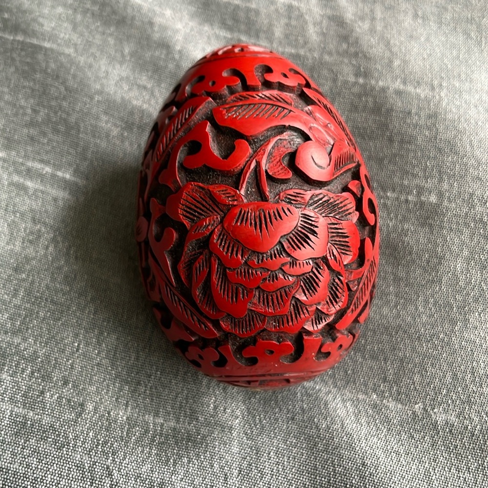 Chinese carved red lacquer egg